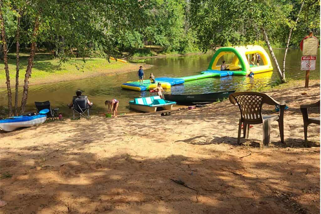 Kids playing in the water at Winding River Campground